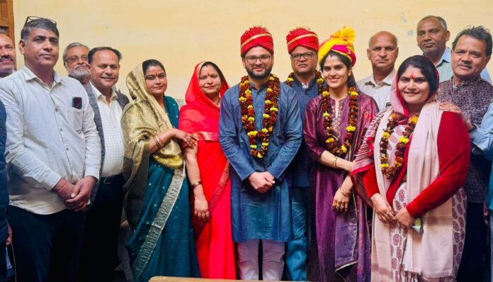Sarpanch Manju Sharma and Dr. Anandraj Sharma honored PhD scholar brother and sister